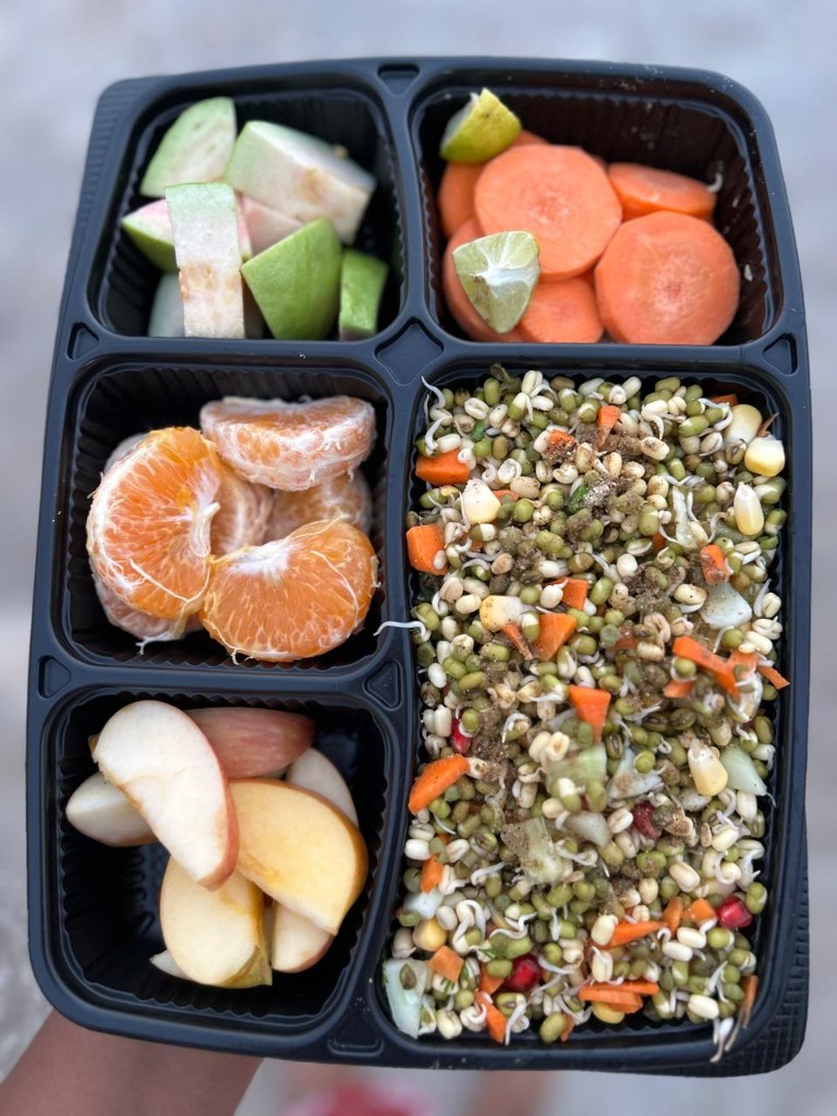 Sprout salad with guava, orange, apple, and zesty vegetables